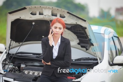 Woman With Car Broke Down Stock Photo