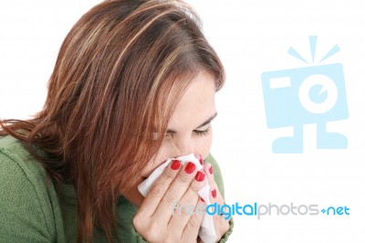 Woman With Cold Blowing Nose Stock Photo