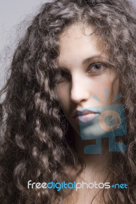 Woman With Curly Hair Stock Photo