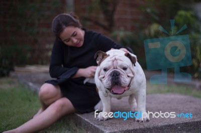 Woman With English Bullldog Stock Photo