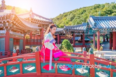 Woman With Hanbok In Gyeongbokgung,the Traditional Korean Dress Stock Photo