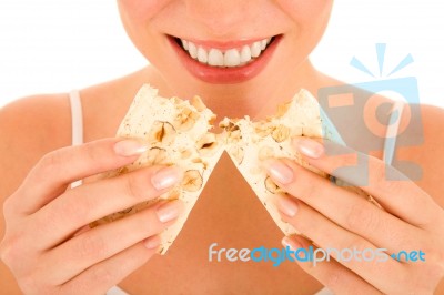 Woman With Nougat Stock Photo