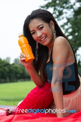 Woman With Orange Juice Stock Photo