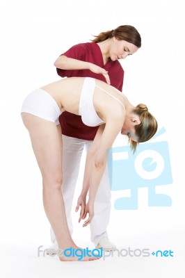 Woman With Physiotherapist Stock Photo