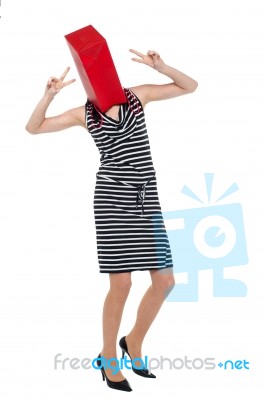 Woman With Shopping Bag As Her Face Stock Photo