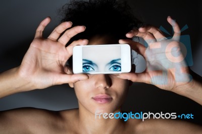 Woman With Smartphone. Concept Of False Identity Stock Photo