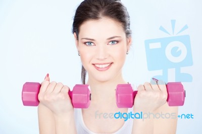 Woman With Two Weights Stock Photo