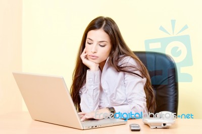 Woman Working On Computer In Office Stock Photo