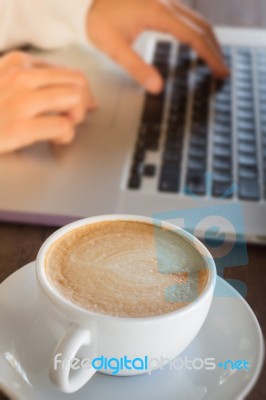 Woman Working With Laptop And Hot Coffee Stock Photo