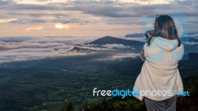 Women Are Shooting Sunrise Stock Photo