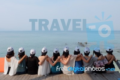 Women Friends Sit Hug Together Look Travel Blue Sea Sky Stock Photo