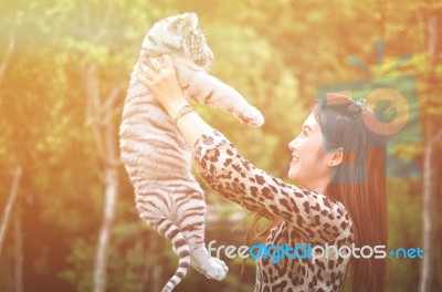 Women Hold Baby White Bengal Tiger Stock Photo Women Hold Baby White Bengal Tiger Stock Photo