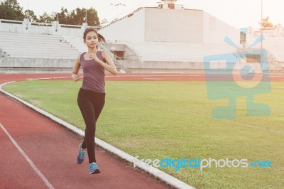 Women Runners Sprinting Outdoors. Healthy Lifestyle And Sport Co… Stock Photo