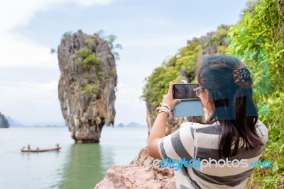 Women Tourist Shooting Natural View By Mobile Phone Stock Photo