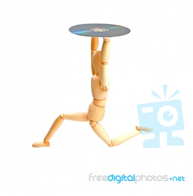 Wood Mannequin With Cd-rom Stock Photo