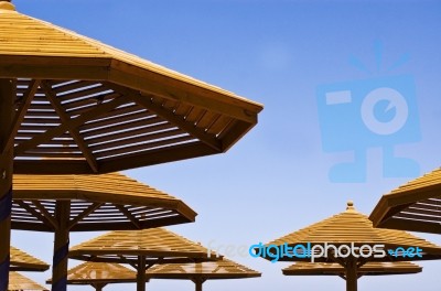 Wooden Beach Umbrellas Stock Photo Royalty Free Image Id 10044696 Wooden Beach Umbrellas Stock Photo