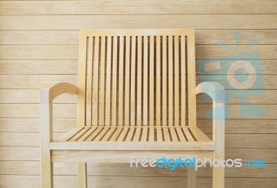 Wooden Chair With Wooden Wall In Background Stock Photo Wooden Chair With Wooden Wall In Background Stock Photo