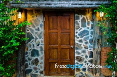 Wooden Door In The Evening Stock Photo