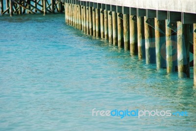 Wooden Jetty Bridge On A Beautiful Maldivian Beach Stock Photo
