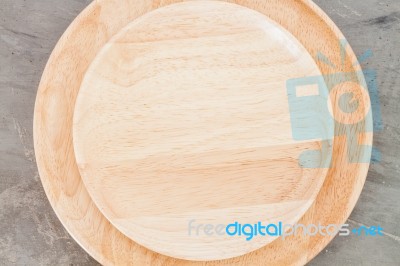 Wooden Plate On Grey Background Stock Photo