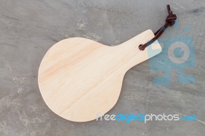 Wooden Plate On Grey Background Stock Photo