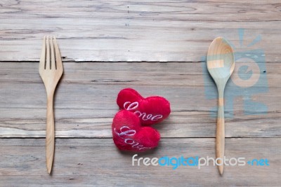 Wooden Spoon Serve With Red Heart On Wood Table Stock Photo