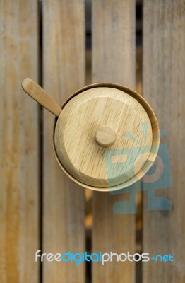 Wooden Sugar Bow On Wood Background Stock Photo