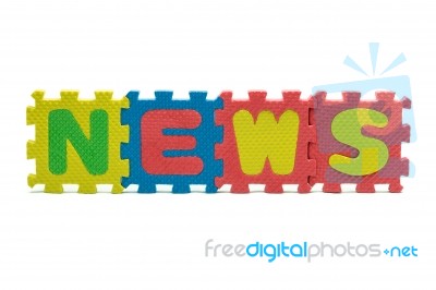 Word News Formed With Colorful Foam Puzzle Toy Isolated On White… Stock Photo