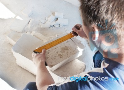 Worker Measures The Ruler Silicate Brick Stock Photo