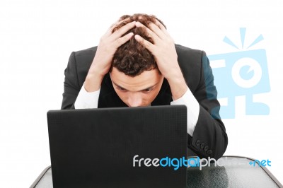 Worried Businessman With Pc Stock Photo
