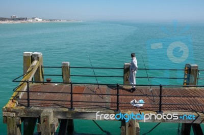 Worthing, West Sussex/uk - April 20 : Fishing From Worthing Pier… Stock Photo