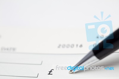 Writing Cheque Stock Photo