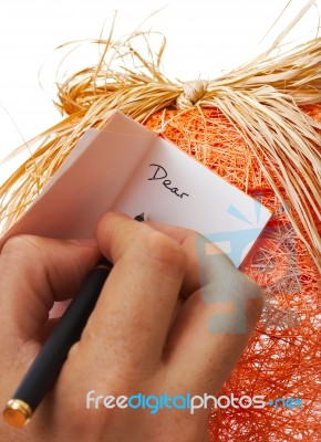 Writing Message On Gift Box Stock Photo