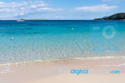 Yacht Off Liscia Ruja Beach Sardinia Stock Photo