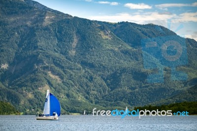 Yachts Sailing On Lake Mondsee In Austria Stock Photo