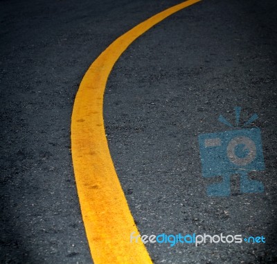 Yellow Lines On Asphalt Stock Photo