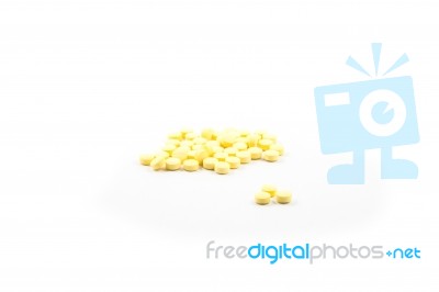 Yellow Pills Isolated On White Background Stock Photo