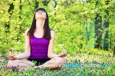 Yoga Relaxation In Forest Stock Photo