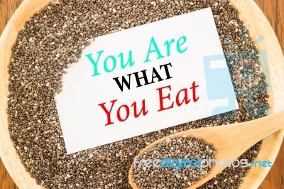 You Are What You Eat Quote On Chia Seeds And Business Card Stock Image