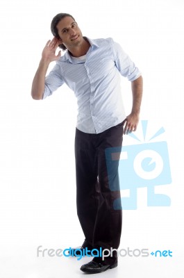 Young American Male Trying To Listen Stock Photo