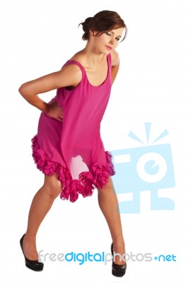 Young And Sexy Woman Model In Pink Dress Posing Stock Photo