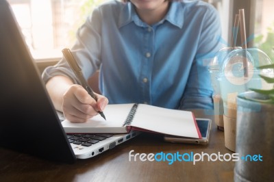 Young Asian Woman Working In Coffee Shop Stock Photo