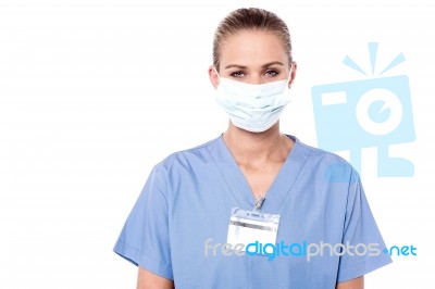 Young Beautiful Doctor In Protective Mask Stock Photo
