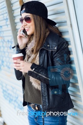 Young Beautiful Woman With Mobile Phone And Coffee Stock Photo