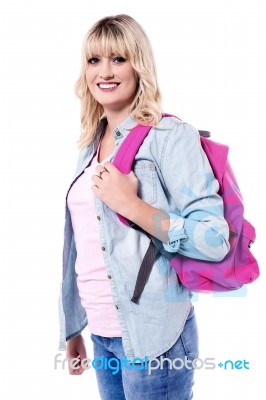 Young Blonde Woman With Backpack Stock Photo