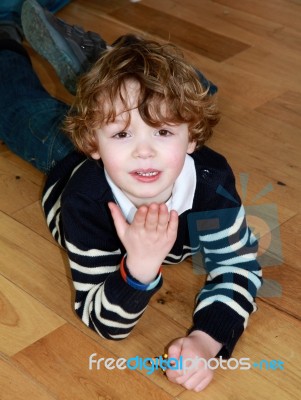 Young Boy Blowing A Kiss Stock Photo