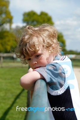 Young Boy Contemplating Stock Photo
