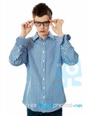Young Boy Wearing Eyeglasses Stock Photo