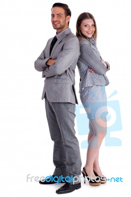 Young Business Collegues Standing Back To Back Stock Photo