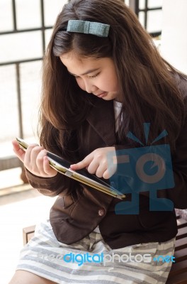 Young Business Girl Using Tablet Computer Stock Photo